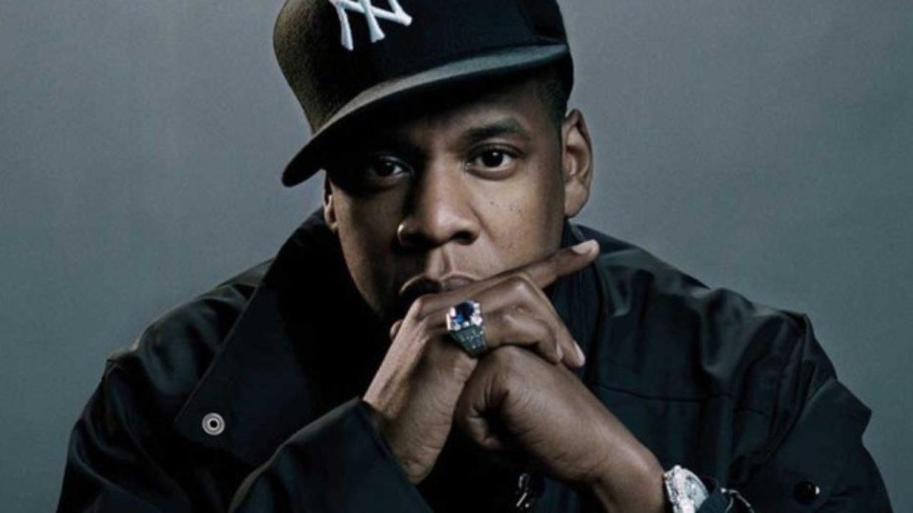 Jay Z sports controversial baseball cap as he alludes to his